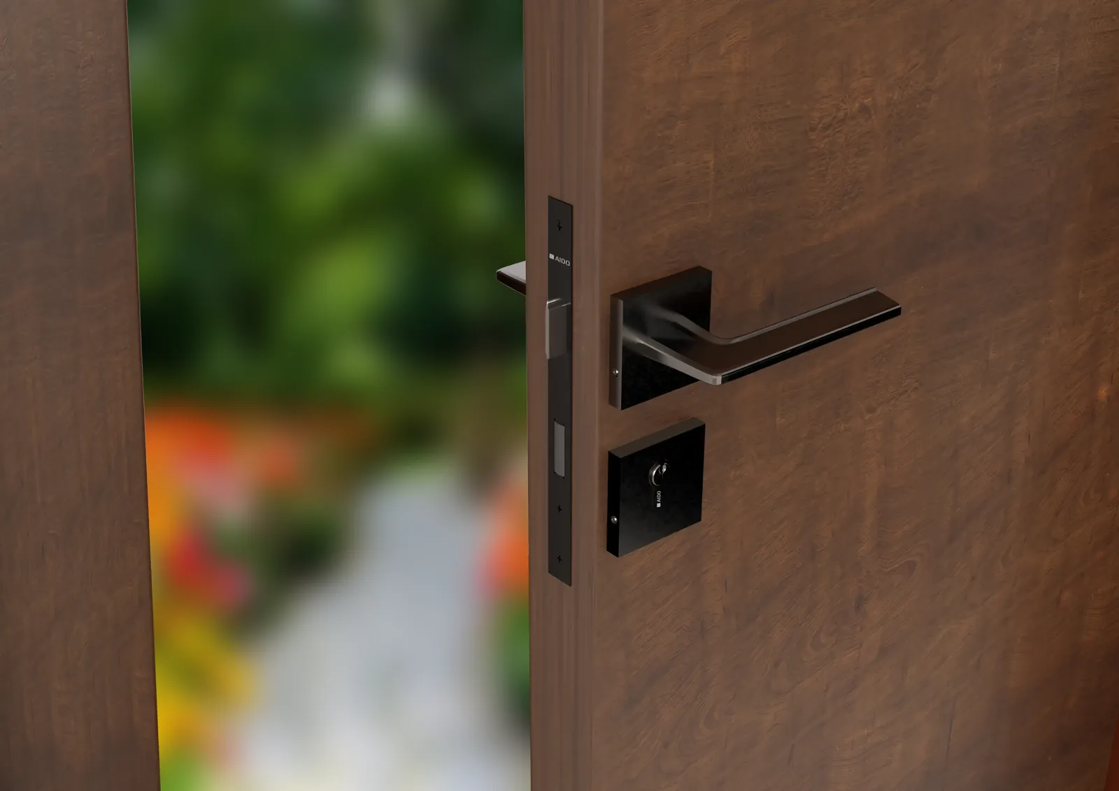 Black lever handle on a dark timber door